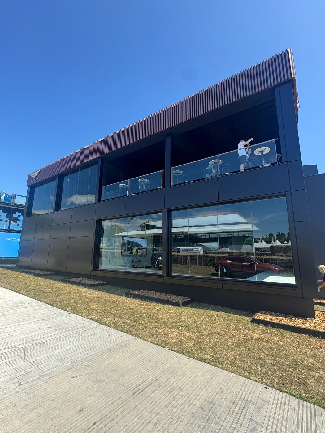 Cleaned glass frontage of the Bentley Pavilion at the Goodwood Festival of Speed — commercial window cleaning in West Sussex
