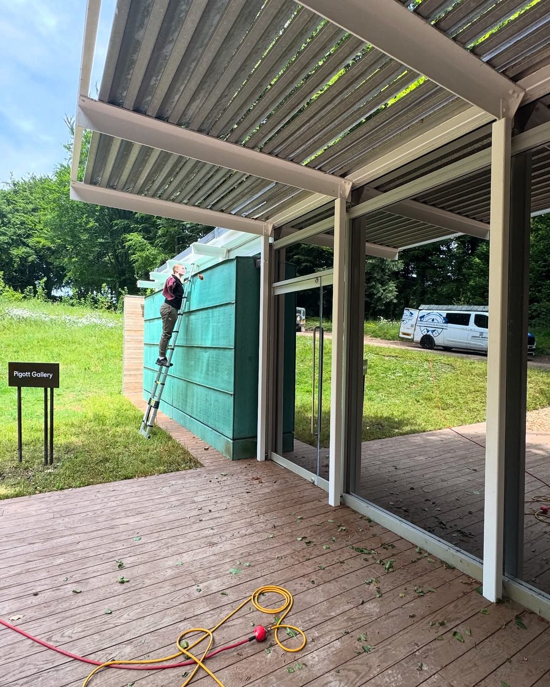 Exterior cleaning at a modern commercial building