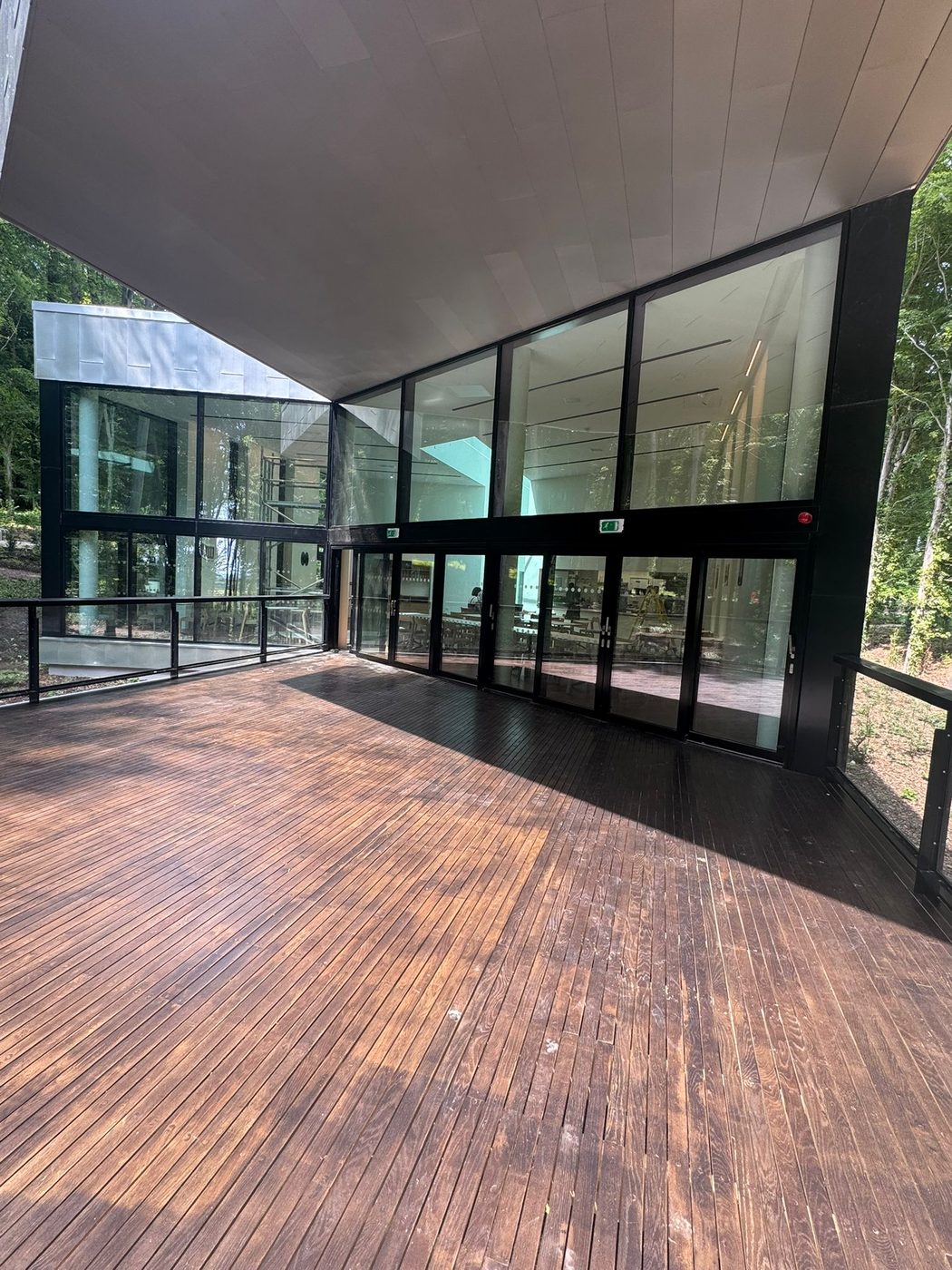 Glazing and exterior of a contemporary commercial building cleaned in West Sussex