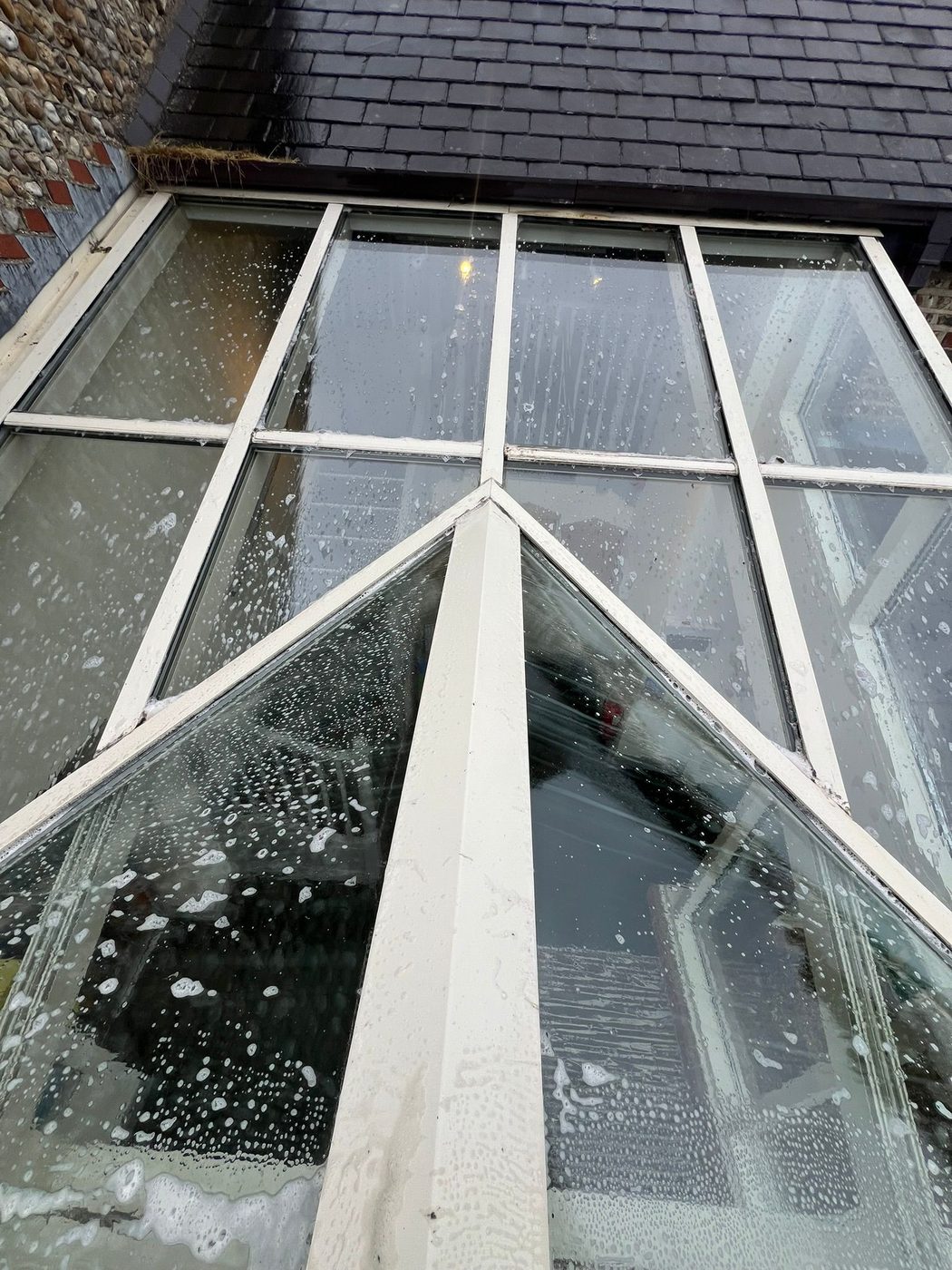 Cleaned glass roof skylight on a uPVC conservatory in West Sussex